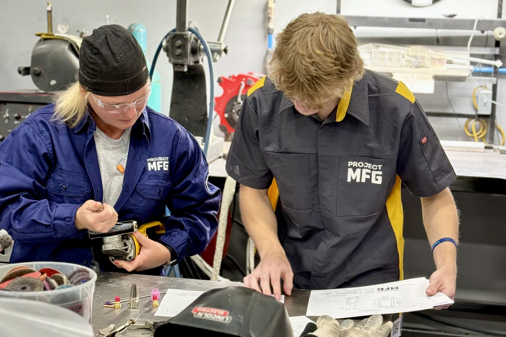 Students working in manufacturing environment